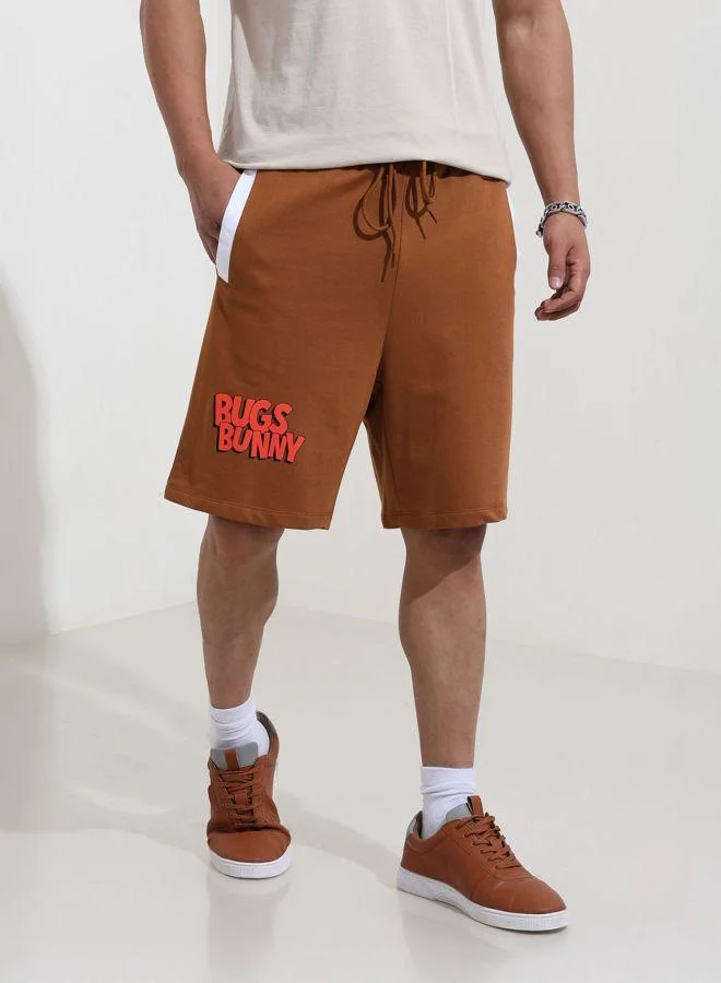 ذا انديان كراج كو Men Oversized Fit Bugs Bunny Printed Side Pocket Mid-Rise Shorts